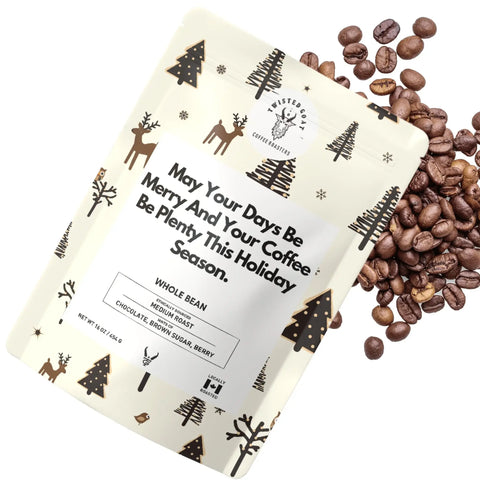 A Christmas Coffee Gift "May Your Days Be Merry" shown with coffee beans spilling out.