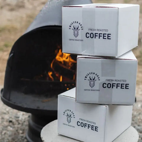 coffee subscription boxes stacked by fire