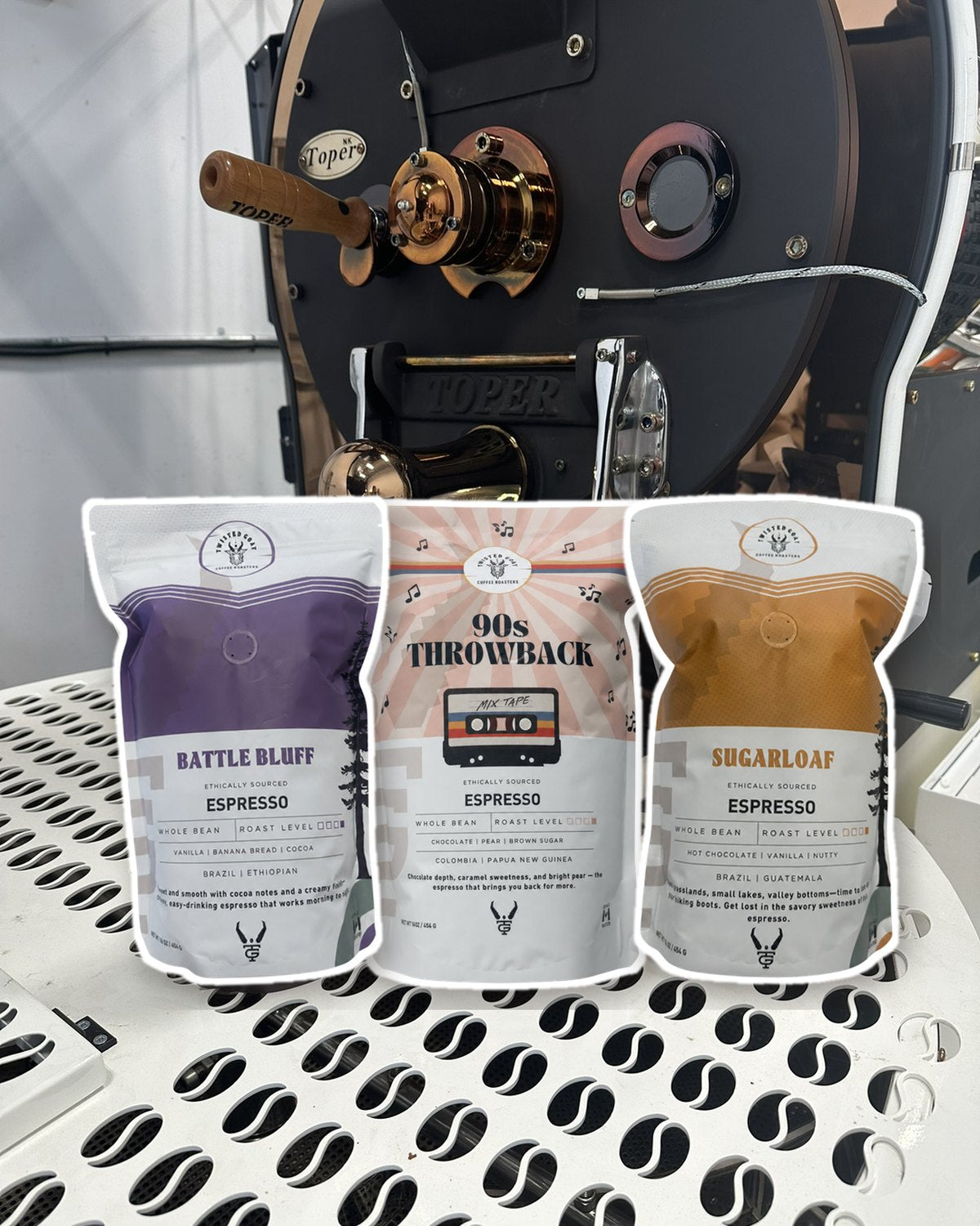 Our Toper roaster in Kamloops with Battle Bluff, 90s Throwback and Sugarloaf bags