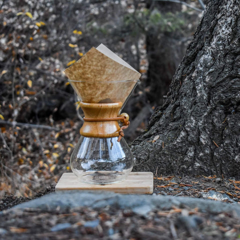 Brewing Coffee Using A Chemex Coffee Maker Outdoors